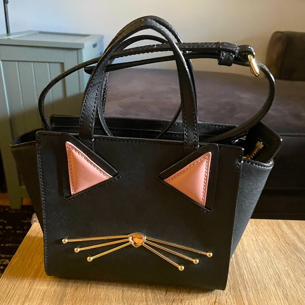 Kate Spade New York Jazz things up Cat Mini Hayden purse like New!